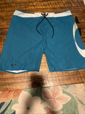 Oakley Teal Blue Men's Swim Board Shorts with White Accents